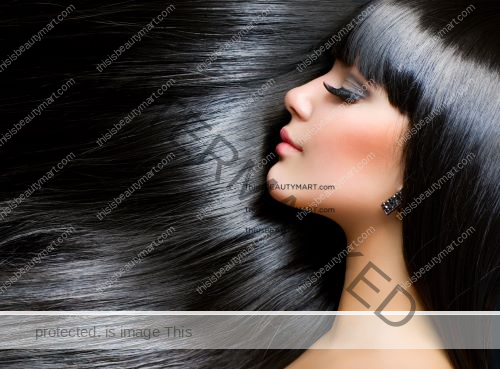 An example of a woman with good hair care with long, jetblack, shiny, healthy, full hair