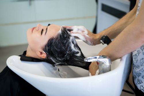 Shampoo being used on client in a salon